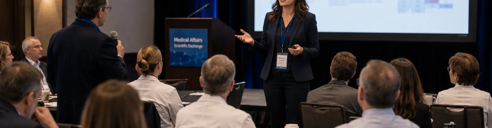 Medical Science Liaison presenting scientific research to physicians and healthcare professionals during a medical conference session.