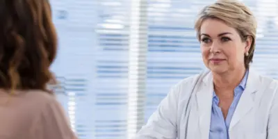 Advanced practice provider participating in a healthcare job interview, discussing compensation, autonomy, and career development.
